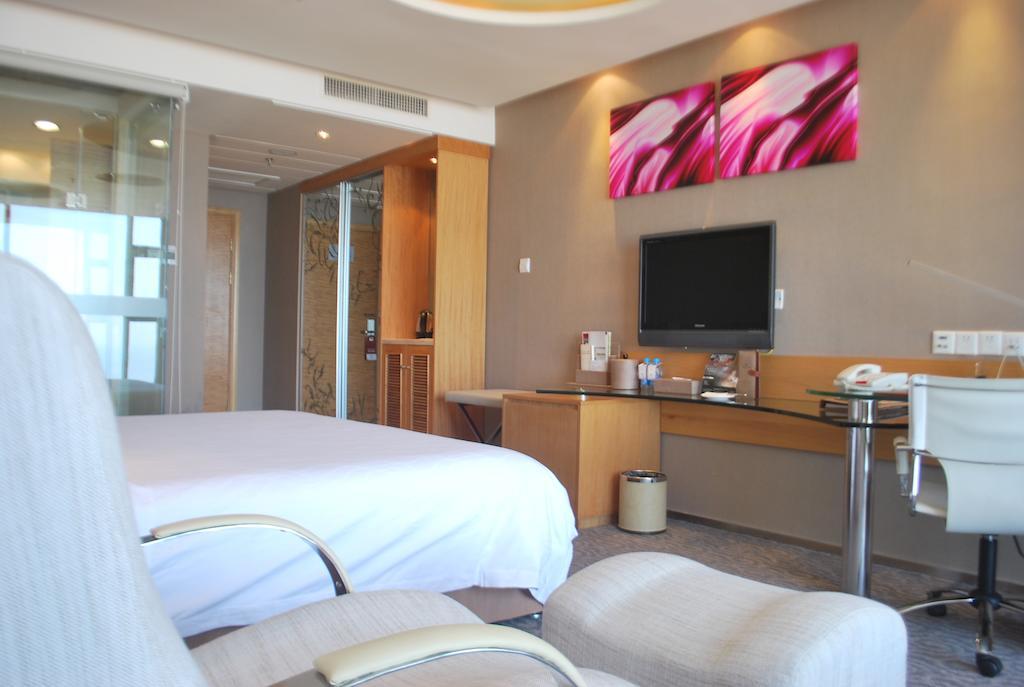 The Center Hotel Weihai Habitación foto